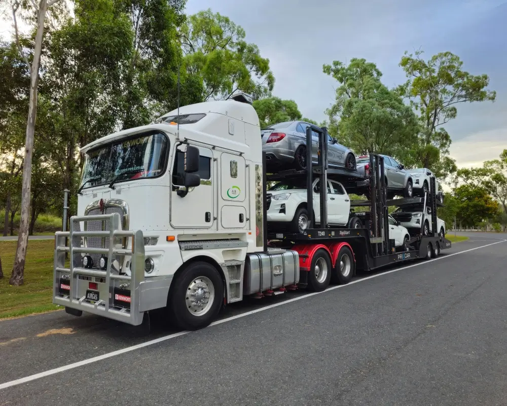 Vehicle transport carriers coordinating vehicle delivery